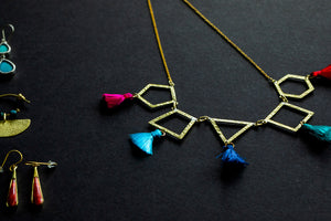 Gold Necklace with Geometric Shapes and Colorful Tassles