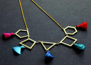 Gold Necklace with Geometric Shapes and Colorful Tassles